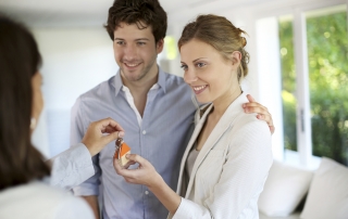 Young couple being house owners